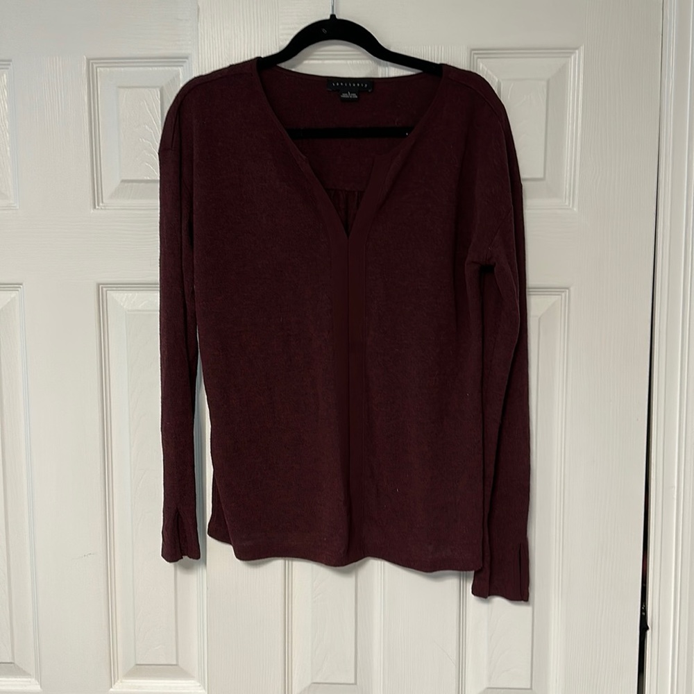 Light weight sweater. Manufacturer is Sanctuary. Size large.